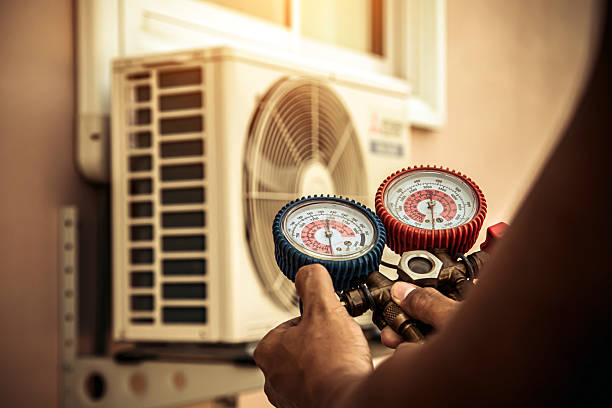 Professional Hvac technician working in Conover, OH